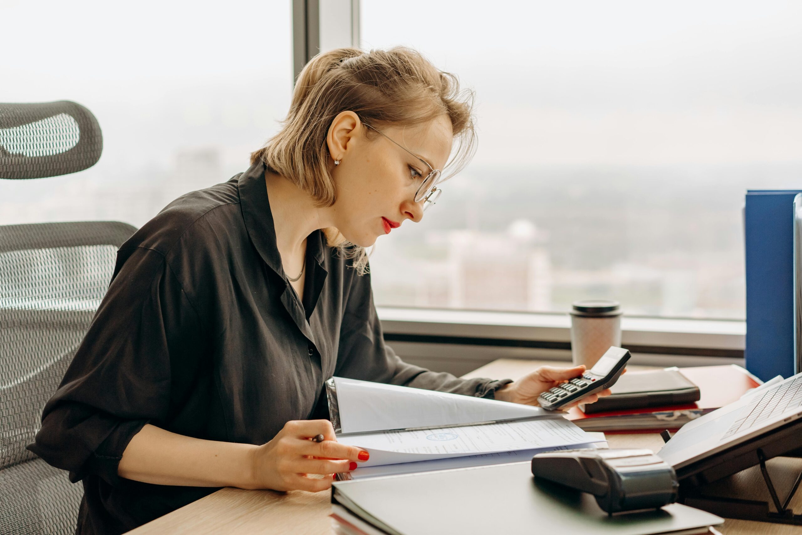 woman looking through documents